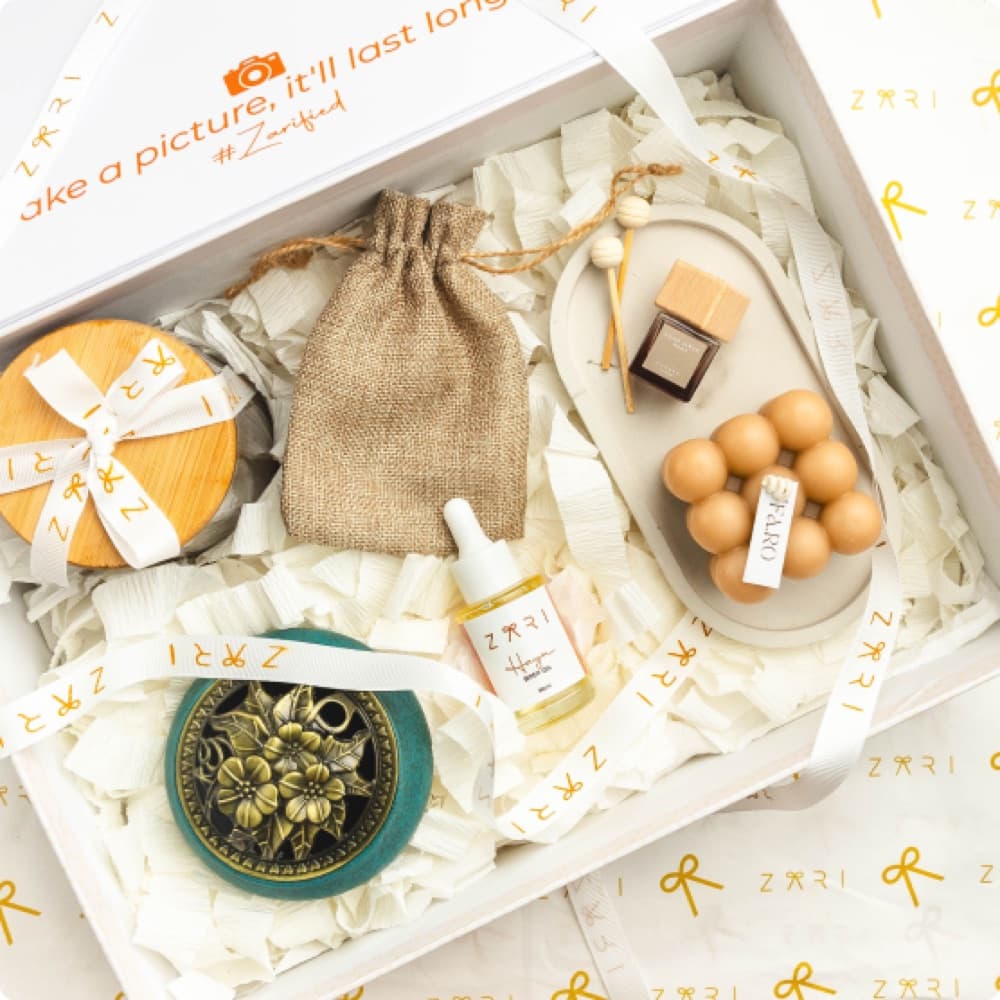 A cream gift box of artisan skincare and treats